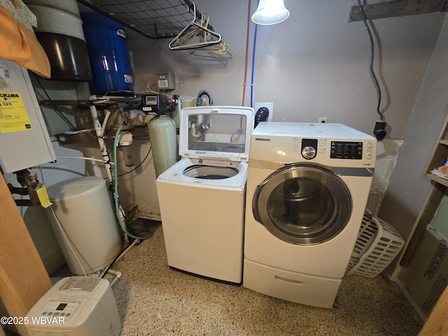 washroom featuring washer and clothes dryer