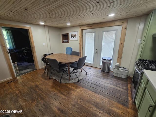 dining space with french doors, dark wood-style flooring, and recessed lighting