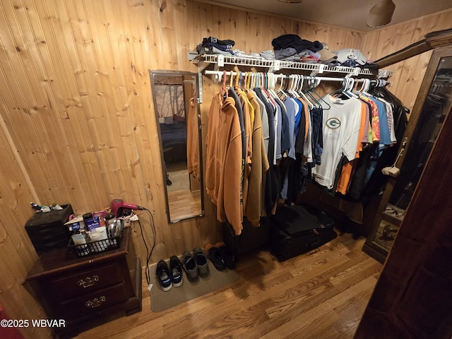 spacious closet featuring wood finished floors