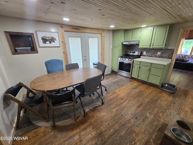 dining space with french doors, dark wood finished floors, and recessed lighting