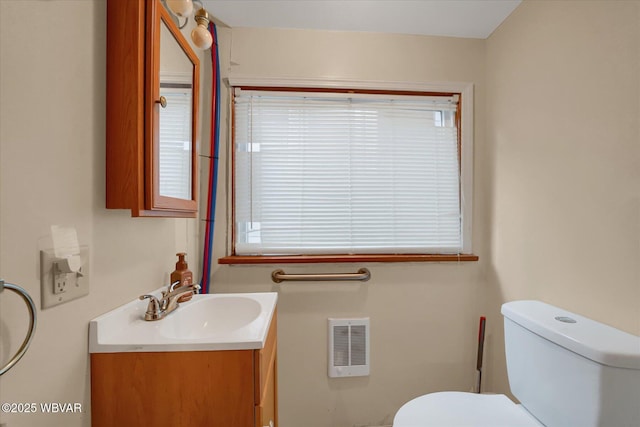 522 S Main St, Jersey Shore, PA 17740 - bathroom featuring visible vents, toilet, and vanity