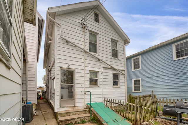 522 S Main St, Jersey Shore, PA 17740 - back of house featuring entry steps and fence