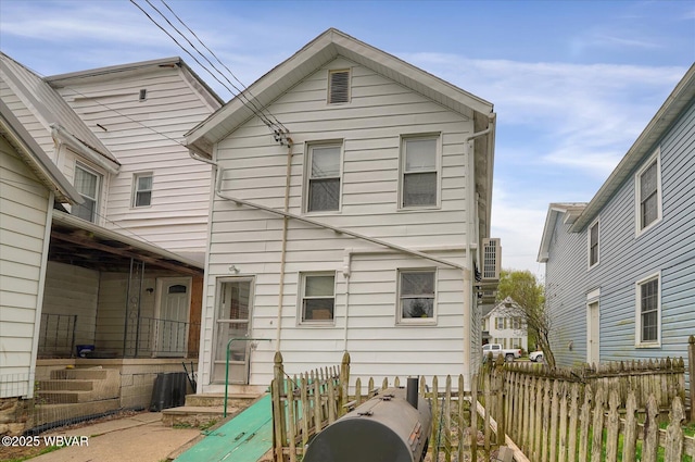 522 S Main St, Jersey Shore, PA 17740 - rear view of house featuring fence