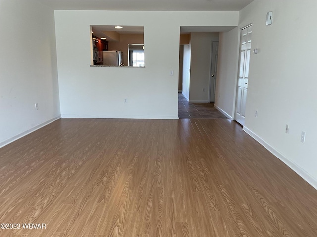 empty room featuring hardwood / wood-style flooring