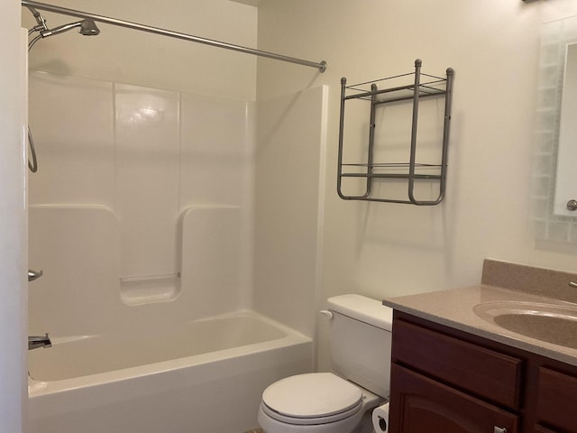 full bathroom featuring vanity, toilet, and washtub / shower combination