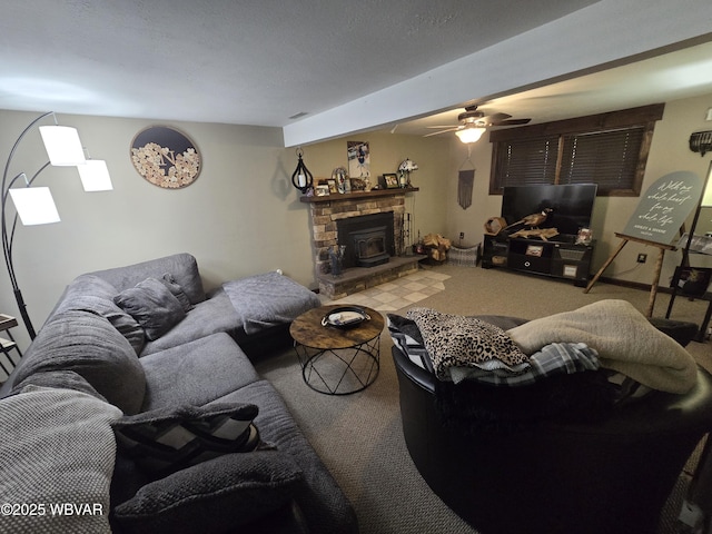 living area with carpet flooring and a ceiling fan