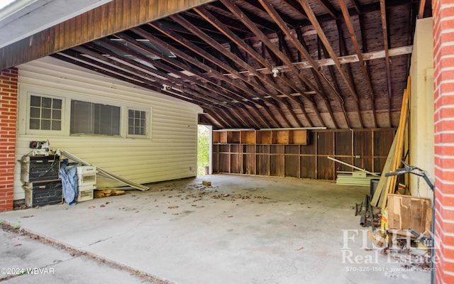 exterior space featuring lofted ceiling