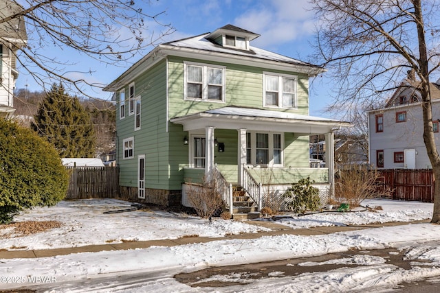 front of property featuring covered porch