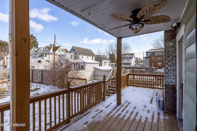 1206 Park Ave, Williamsport, PA 17701 - snow covered deck featuring a residential view, ceiling fan, and fence