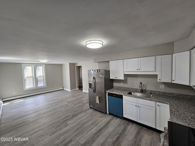 kitchen with wood finished floors, dishwasher, a sink, stainless steel fridge with ice dispenser, and a baseboard radiator