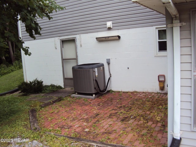 117 Oak Ln, Lock Haven, PA 17745 - view of home's exterior with concrete block siding and a patio area