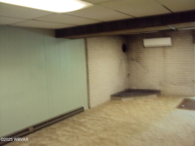 117 Oak Ln, Lock Haven, PA 17745 - finished below grade area featuring a paneled ceiling, a wall mounted air conditioner, carpet flooring, and a baseboard radiator