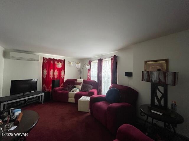 carpeted living room with an AC wall unit