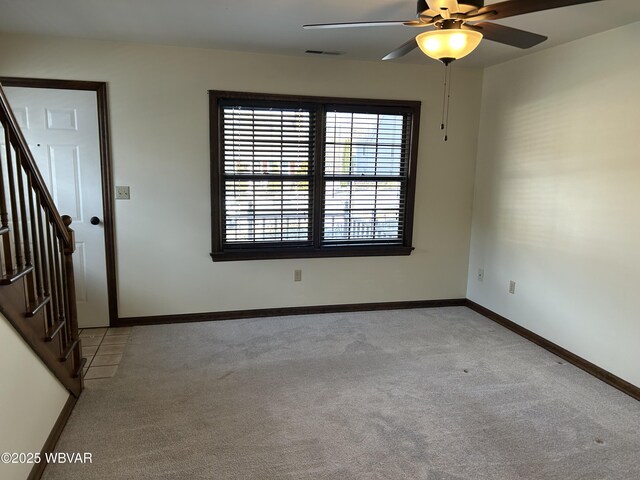 living room featuring light carpet