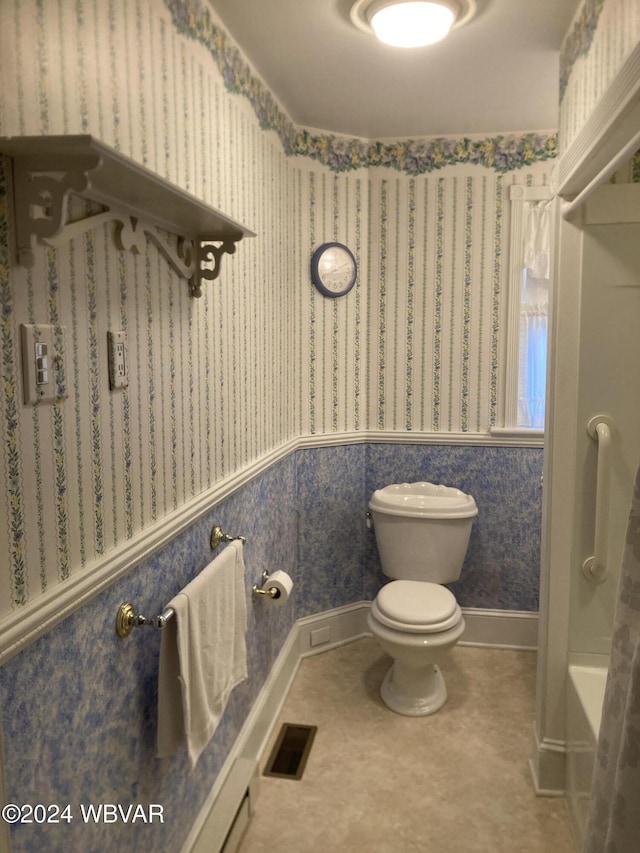 bathroom featuring toilet