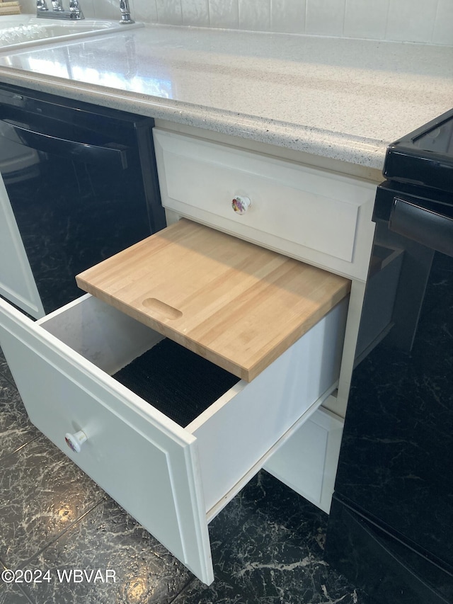 interior details featuring black appliances