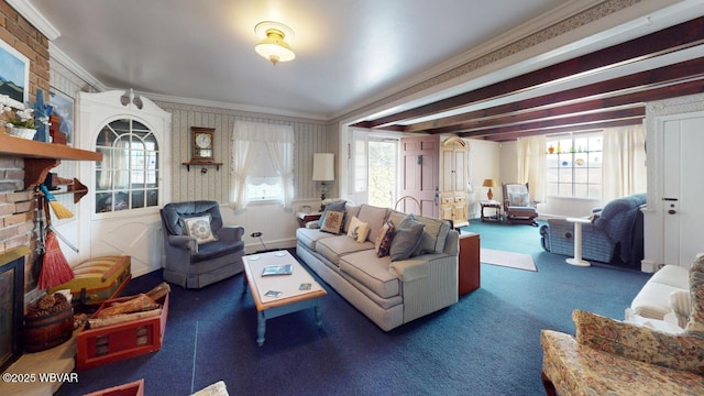 living area featuring ornamental molding, a brick fireplace, and dark carpet