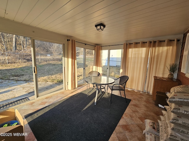 sunroom with wooden ceiling