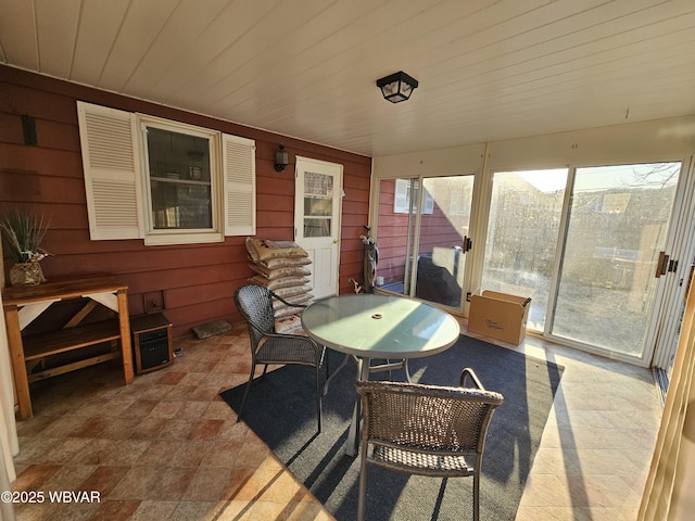 sunroom / solarium with wood ceiling