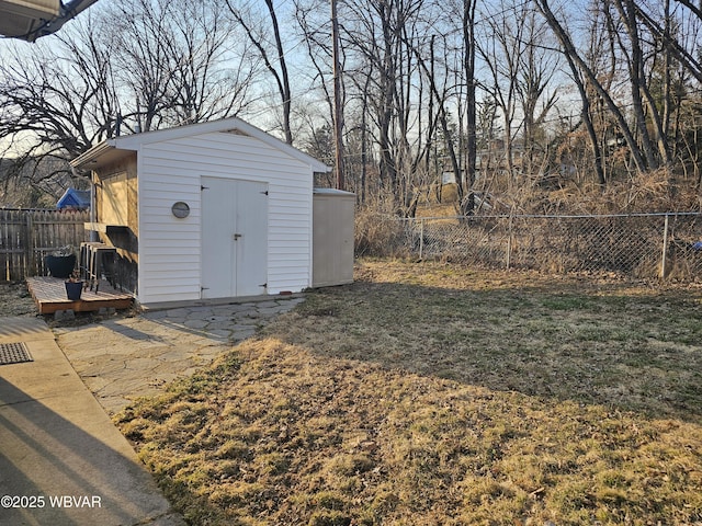 view of shed featuring a fenced backyard