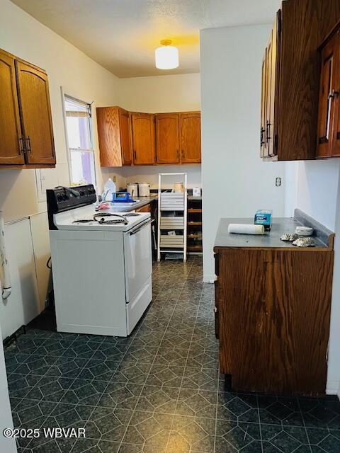 kitchen featuring electric range