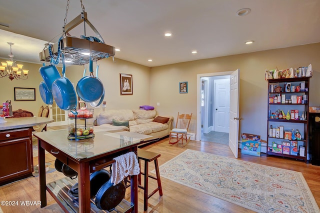 kitchen with light wood-style floors, a chandelier, and recessed lighting