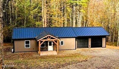 131 Spring House Rd, Muncy Valley, PA 17758 - view of outdoor structure featuring driveway and a forest view