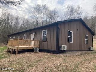 131 Spring House Rd, Muncy Valley, PA 17758 - back of property featuring a wooden deck and ac unit
