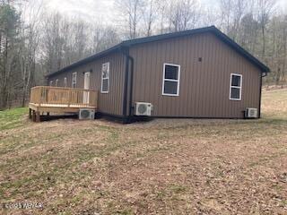 131 Spring House Rd, Muncy Valley, PA 17758 - view of side of home with ac unit and a deck