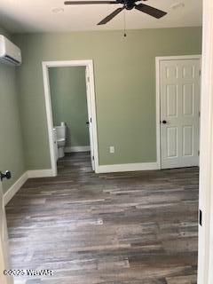 131 Spring House Rd, Muncy Valley, PA 17758 - unfurnished bedroom with ceiling fan, baseboards, wood finished floors, and a wall mounted AC