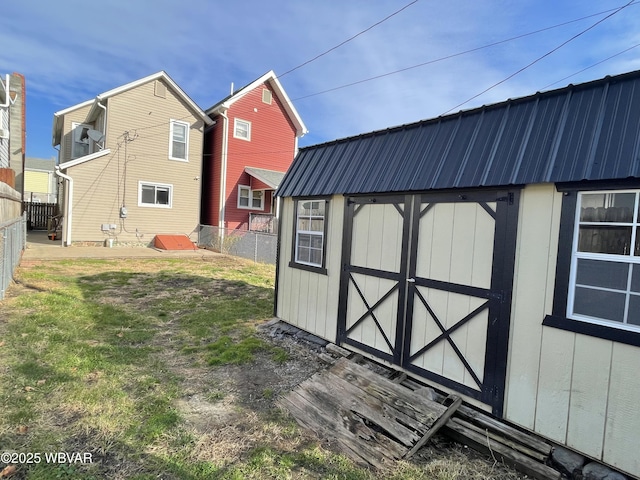 view of outdoor structure with a yard