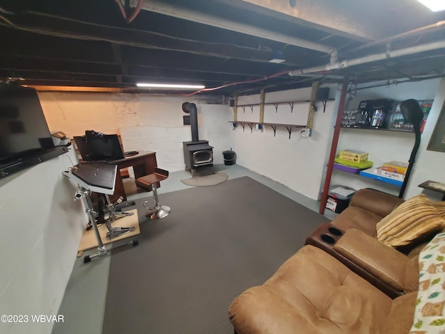 basement featuring a wood stove