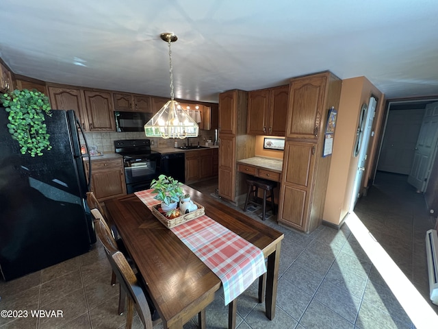 tiled dining space featuring sink