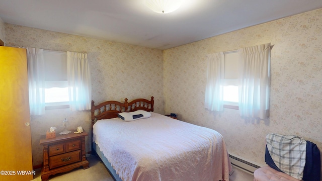 bedroom featuring wallpapered walls and a baseboard radiator