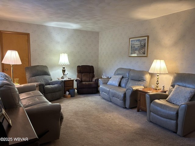 carpeted living area featuring wallpapered walls