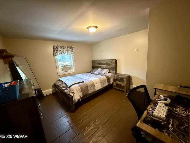 bedroom with hardwood / wood-style floors and cooling unit