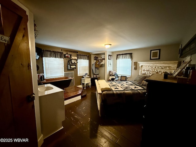 bedroom featuring hardwood / wood-style floors