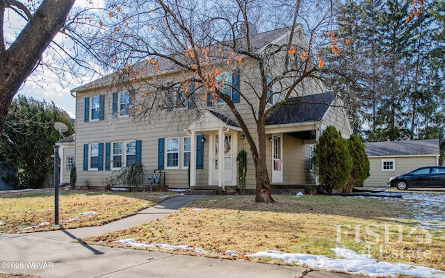 view of front of home with a front yard