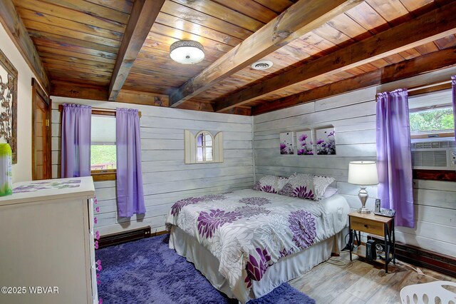 1640 Pleasant Valley Rd, Cogan Station, PA 17728 - bedroom with wooden ceiling with exposed beams, wood finished floors, wood walls, and cooling unit