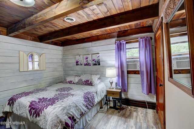 1640 Pleasant Valley Rd, Cogan Station, PA 17728 - bedroom with wooden ceiling with exposed beams, wood finished floors, and wood walls