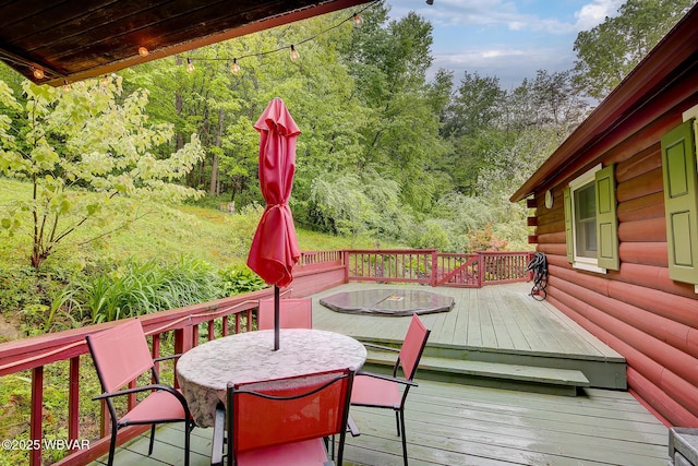 1640 Pleasant Valley Rd, Cogan Station, PA 17728 - wooden deck with outdoor dining space and a forest view