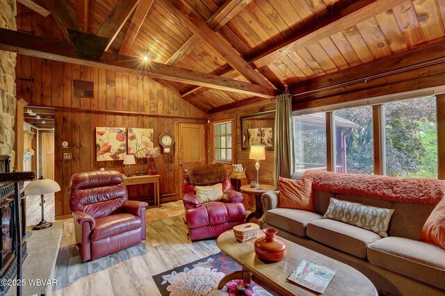 1640 Pleasant Valley Rd, Cogan Station, PA 17728 - living area featuring wooden ceiling, wooden walls, and light wood-style floors