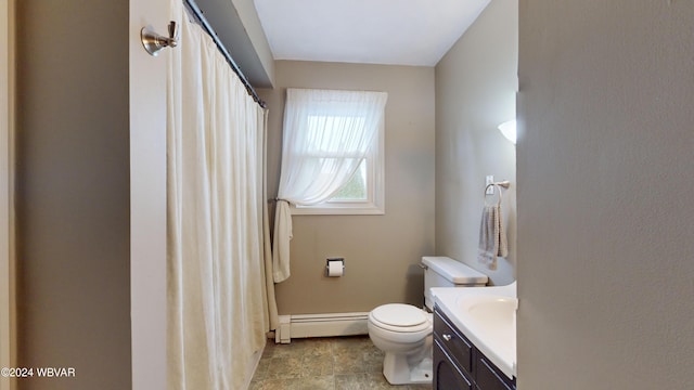 bathroom with vanity, a baseboard radiator, and toilet