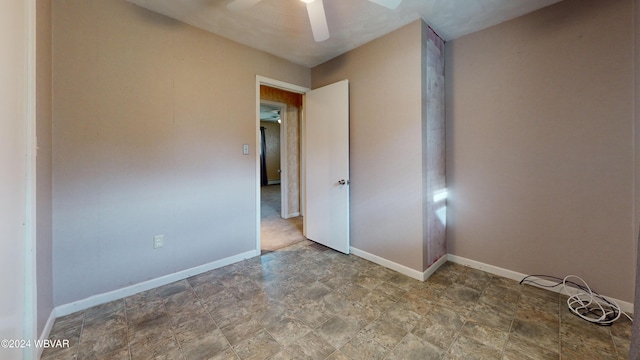 unfurnished room featuring ceiling fan