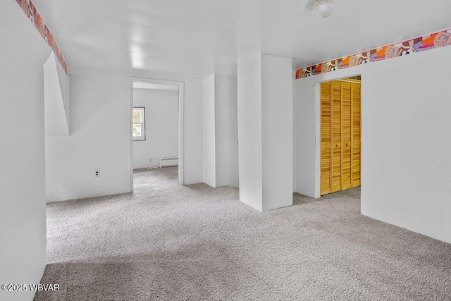 1462 Highland Lake Rd, Hughesville, PA 17737 - empty room with a baseboard radiator and carpet floors