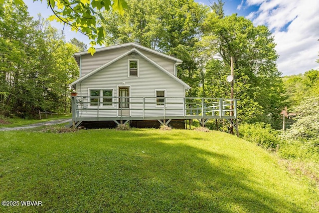 1462 Highland Lake Rd, Hughesville, PA 17737 - rear view of house featuring a deck and a yard