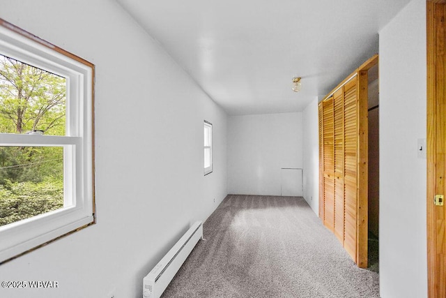 1462 Highland Lake Rd, Hughesville, PA 17737 - unfurnished bedroom featuring baseboard heating and carpet flooring