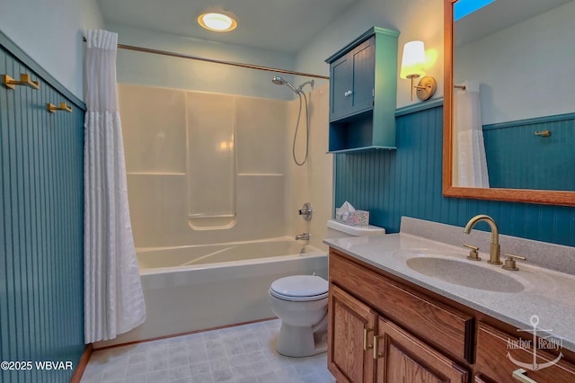 2312 Teaberry Ln, Lock Haven, PA 17745 - full bath featuring toilet, shower / bath combination with curtain, wainscoting, and vanity