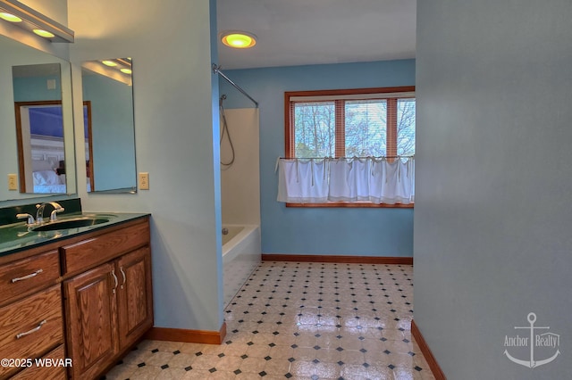 2312 Teaberry Ln, Lock Haven, PA 17745 - bathroom featuring tile patterned floors, shower / bathing tub combination, vanity, and baseboards