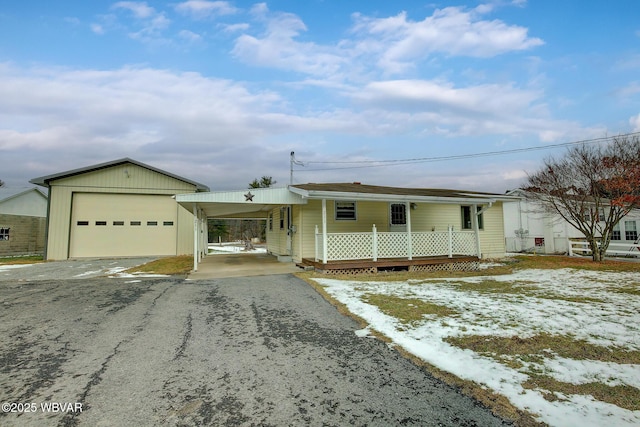 view of front of home with a garage and covered porch